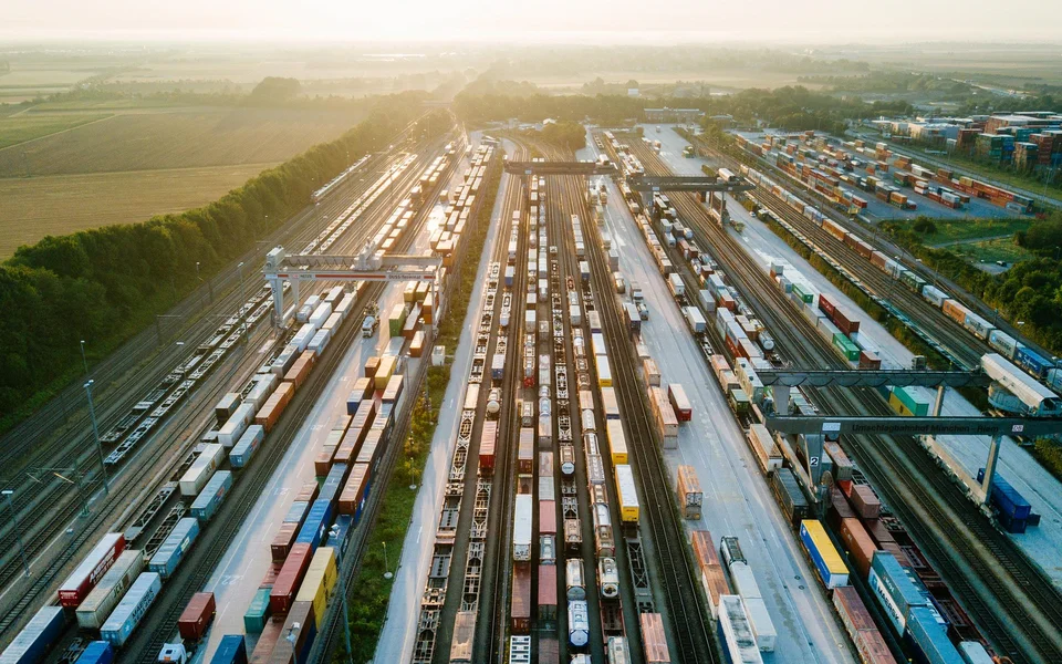 An aerial view of a freight station with many trains